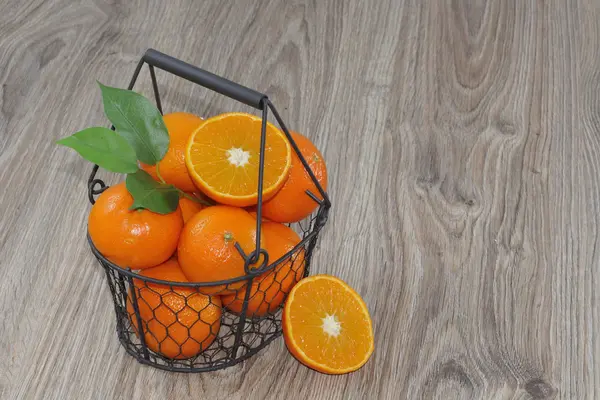 Clementines in a basket — Stock Photo, Image