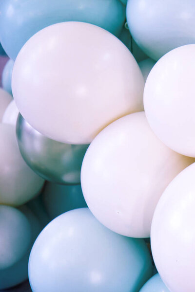 Background of multicolored balloons of nude colors. Abstract background. Various colorful party balloons