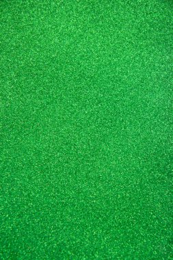 Soyut yeşil moda fon. Parlak holografik folyo arka planı. Renkli parlak bir arka plan. Düz yatıyordu