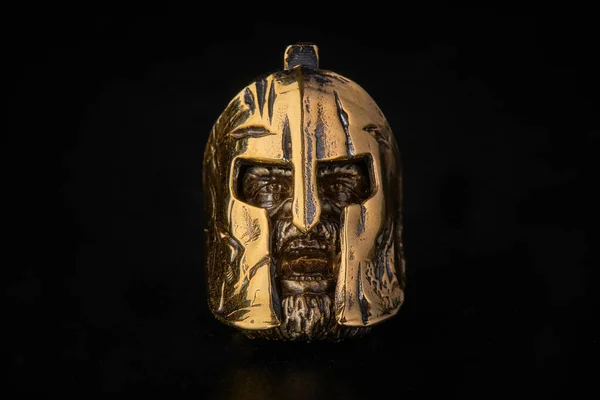 A golden helmet. The Spartans helmet. Warriors Helmet