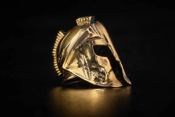 A golden helmet. The Spartans helmet. Warriors Helmet
