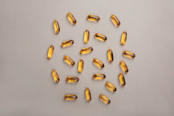 Transparente Vitamine Gelb Auf Grauem Hintergrund Flache Lage — Stockfoto