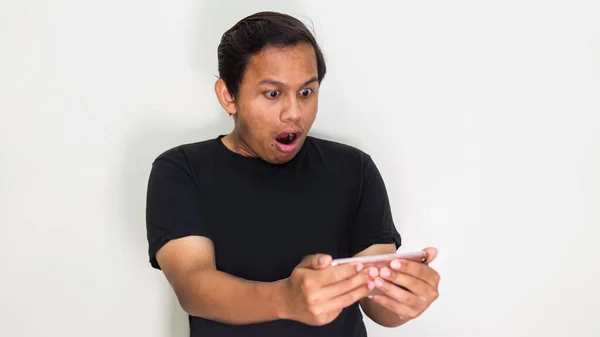 Wow Chokeret Ansigtsudtryk Ung Asiatisk Malaysisk Mand Med Sort Shirt - Stock-foto