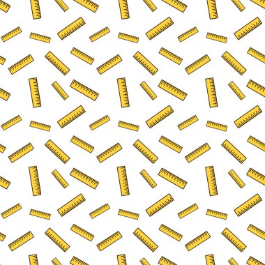 Sarı bir cetvel. Koyu kahverengi bir dış hatla dikdörtgendir ve üst kenarı boyunca siyah ölçüm işaretleri içerir..