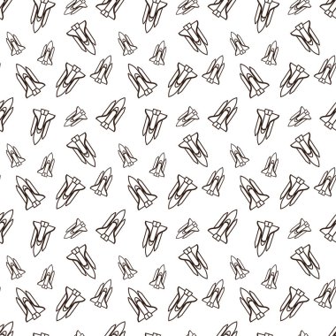 Çizgi film tarzı uzay mekiği krem renkli bir vücut, kırmızı bir burun konisi, ve krema ve gri kanatlar veya iticiler.