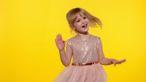 Child making faces, fooling around, showing tongue. Little blonde teen kid girl 5-6 years old posing — Stock Footage Child making faces, fooling around, showing tongue. Little blonde teen kid girl 5-6 years old posing Royalty Free Stock Footage