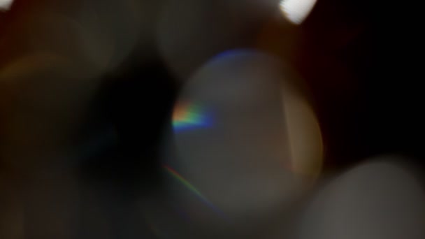 Filtraciones de luz multicolor imágenes sobre fondo negro, sobreposiciones de estallido de fuga de bengalas de lentes transiciones — Vídeo de stock