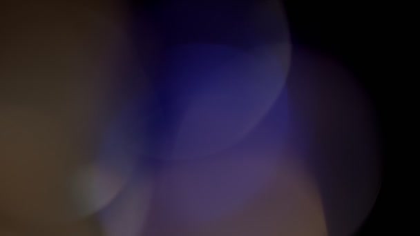 ライトリーク抽象的なぼやけた4K映像。動く点滅円レンズグローフレアボケオーバーレイ — ストック動画