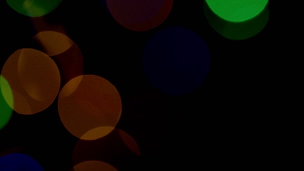 Multicolore perdite di luce 4k filmati su sfondo nero, lente studio brillamento perdite sovrapposizioni burst — Video Stock