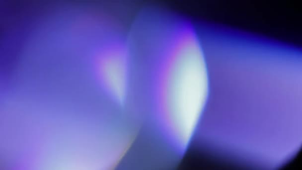 Multicolored light leaks footage on black background, lens flare leak burst overlays transitions — Stock Video
