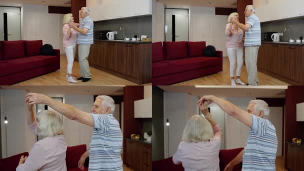 Pareja madura feliz bailando riendo en la cocina en casa, celebrando aniversario, divirtiéndose — Vídeos de Stock