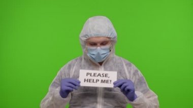 PPE kıyafetli doktor, metin yazma sloganı: 