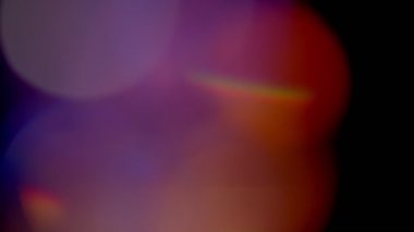 Projeler için ışık sızıntısı 4K görüntü, optik parlaklık lensi bokeh geçiş arkaplanı örtüyor
