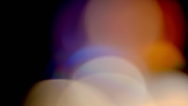काळ्या पार्श्वभूमीवर बहु रंगीबेरंगी प्रकाश गळती, लेन्स फ्लेअर गळती संक्रमण ओव्हरलॅज — स्टॉक व्हिडिओ