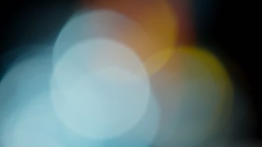 Projeler için ışık sızıntısı 4K görüntü, optik parlaklık lensi bokeh geçiş arkaplanı örtüyor