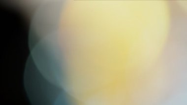 Projeler için ışık sızıntısı 4K görüntü, optik parlaklık lensi bokeh geçiş arkaplanı örtüyor