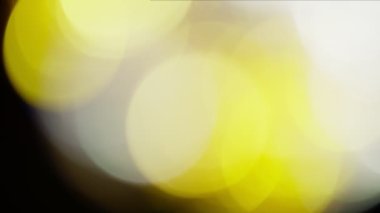Projeler için ışık sızıntısı 4K görüntü, optik parlaklık lensi bokeh geçiş arkaplanı örtüyor