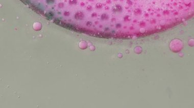 Renkli su boyasının makro yapısı yağ kabarcıkları hareketi, parlak renkli akrilik boya.