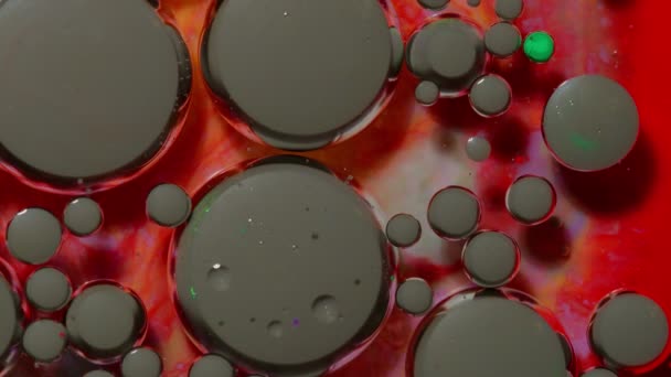 Colorful black red bubbles surface wallpaper themes background, multicolor space universe concept — Stock Video