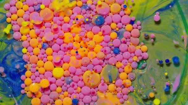 Colorful orange pink bubbles surface wallpaper themes background, multicolor space universe concept — Stock Video