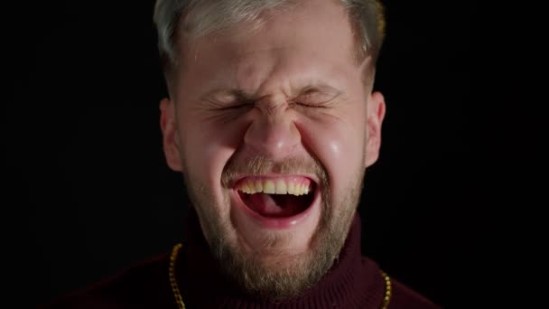 Stylish smiling young man in rtrendy clothes looking at camera, laughting at loud, feeling happiness — Stock Video