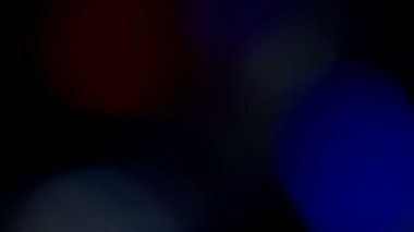 Projeler için ışık sızıntısı 4K görüntü, optik parlaklık lensi bokeh geçiş arkaplanı örtüyor