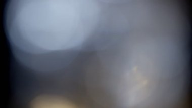 Projeler için ışık sızıntısı 4K görüntü, optik parlaklık lensi bokeh geçiş arkaplanı örtüyor