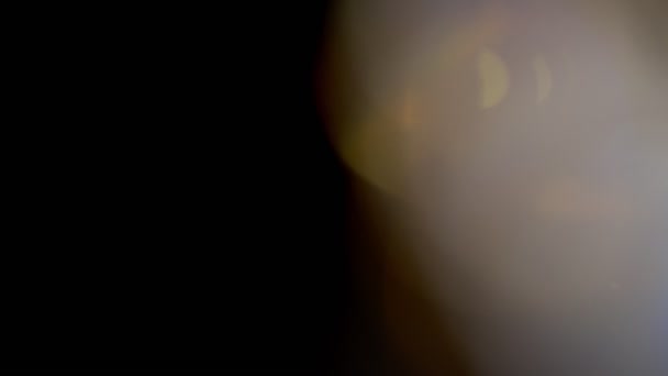 Světlo uniká abstraktní rozmazané 4K záběry, pohybující se kruh čočky záře světlice bokeh překryvy — Stock video
