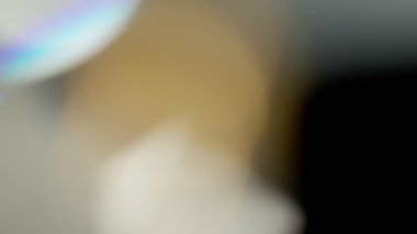 Projeler için ışık sızıntısı 4K görüntü, optik parlaklık lensi bokeh geçiş arkaplanı örtüyor