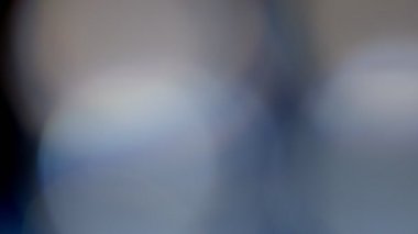 Projeler için ışık sızıntısı 4K görüntü, optik parlaklık lensi bokeh geçiş arkaplanı örtüyor