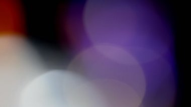 Projeler için ışık sızıntısı 4K görüntü, optik parlaklık lensi bokeh geçiş arkaplanı örtüyor