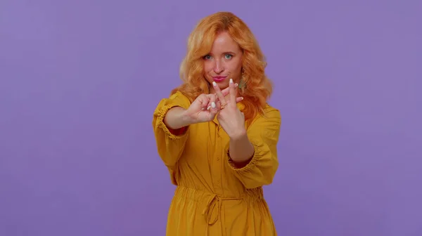 Cheerful redhead girl showing hashtag symbol with hands, likes tagged message, popular viral content