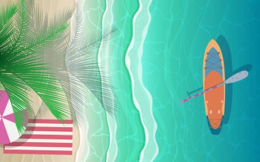 Tepe manzaralı kano ve şemsiye gündüz kumsalda.