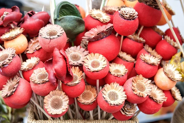 VILNIUS, LITHUANIA - MARCH 7: flowers from dried flowers. Herbage are tied and drying in the loft.Fragment photo of annual traditional crafts fair - Kaziuko fair on Mar 7, 2015 in Vilnius, Lithuania — Stock Photo, Image