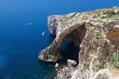 Nice Blue Grotto view in Malta island with clear blue sea background, touristic destination in Malta, Blue Grotto, popular place in Malta, Malta, maltese nature, Europe clipart