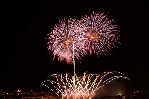 Big colorful fireworks explode in Malta in dark sky,Malta fireworks festival, 4 July, Independence, fireworks explode, New Year, fireworks in Zurrieq , Malta — Stock Photo, Image