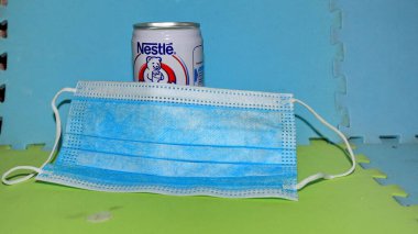  Nestle ayı damgalı tıbbi maske, 9 Temmuz 2021 'de Covid, Batang, Endonezya ile sağlıklı bir vücudun korunmasına yardımcı olur.