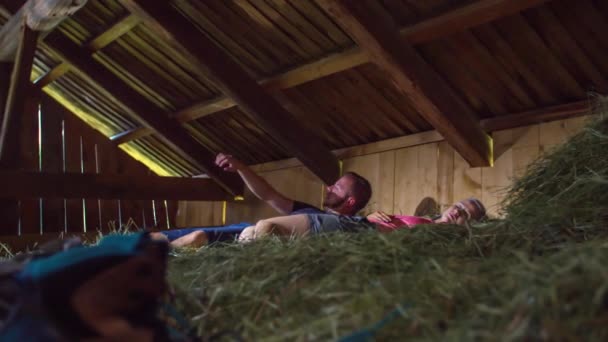 Young Couple Sleep Hay Loft Wake Sit Stretch Point Day — Stock Video