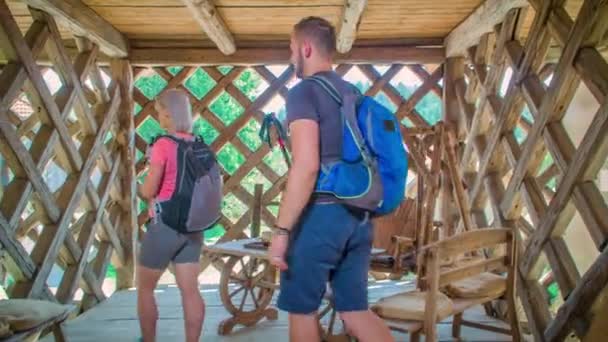 Hikers Stop Break Wooden Cabin Handheld — Stock Video