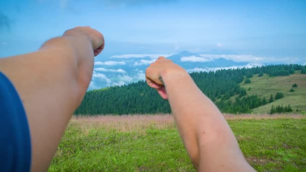 Two Hikers Hands Pointing Horizon High Clouds — Stock Video