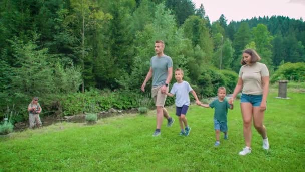 Young Family Walks Stream Fisherman Fly Fishing Slovenia Royalty Free Stock Video