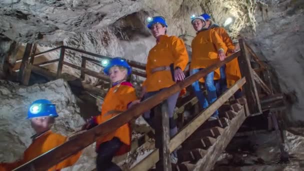 Extended Family Spends Quality Time Together Exploring Underground Mine While — Stock Video