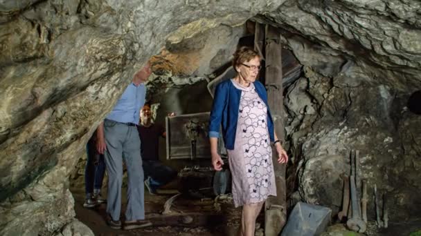 Grandparents Young Couple Visit Mine Dense Narrow Stone Walls Admire — Stock Video