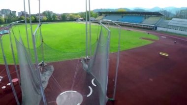 hammer throw discipline at a running track court