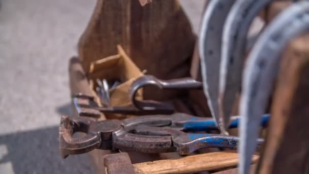 Tools which is blacksmith using in his work on rustic fair — Stok video