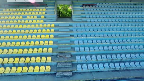 Chairs at a running track court — Stock Video