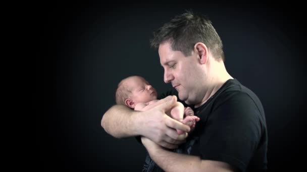 Father holding the baby — Stock Video