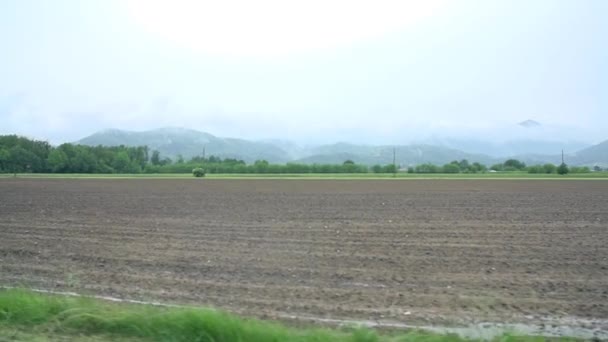 Driving pass a farm land — Stock Video