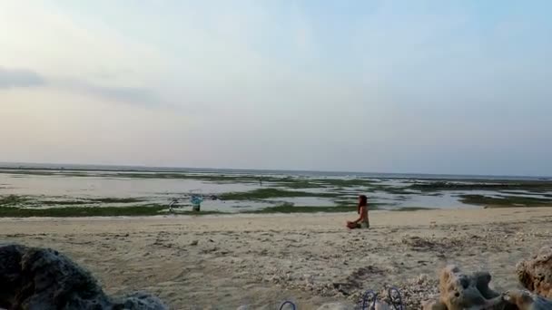 Girl meditating in Gili Air island — Stock Video