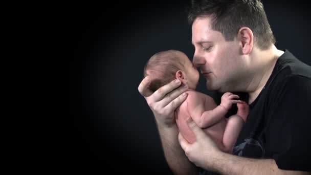 Father holding the baby — Stock Video